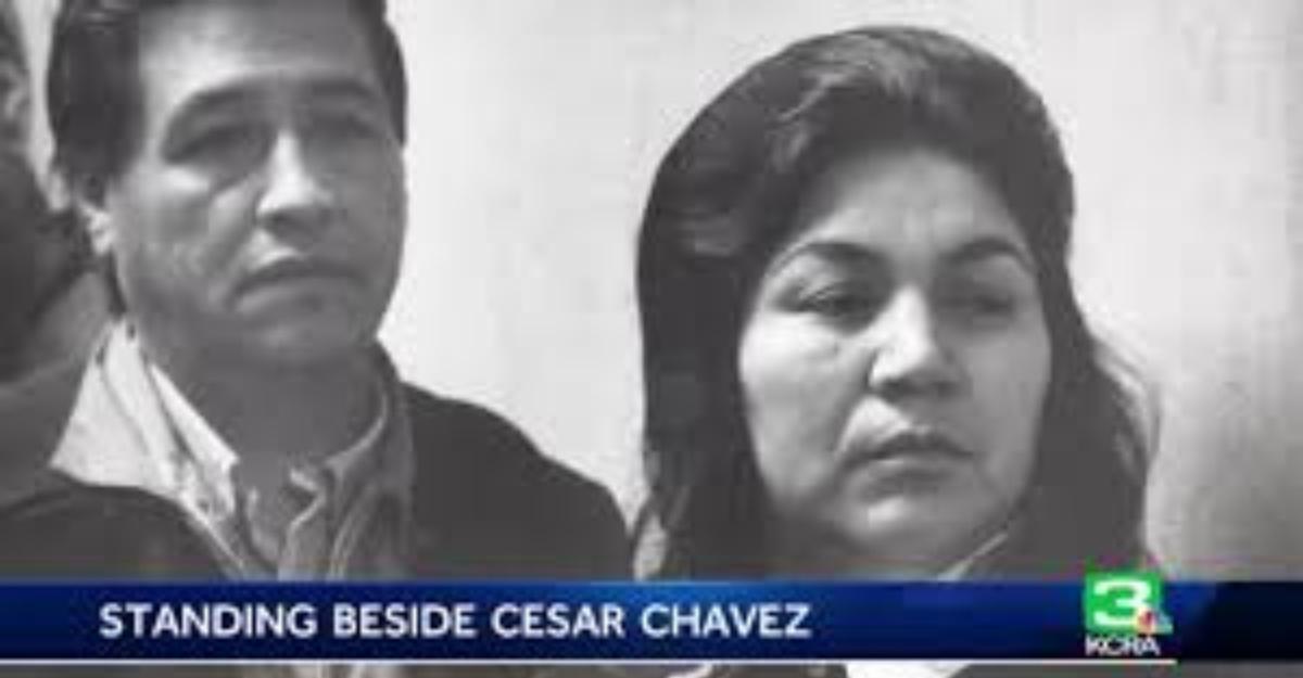 Helen Fabela Chavez stands in front of labor rights activist Cesar Chavez.