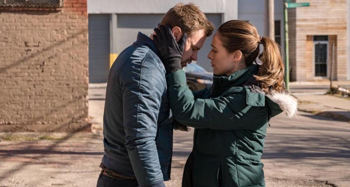  Kim Burgess consoling Adam Ruzek on 'Chicago P.D.' 