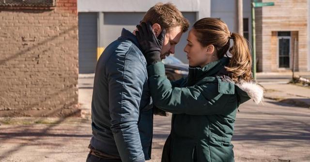 Kim Burgess consoling Adam Ruzek on 'Chicago P.D.'