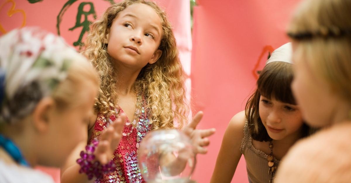 young girl with crystal ball