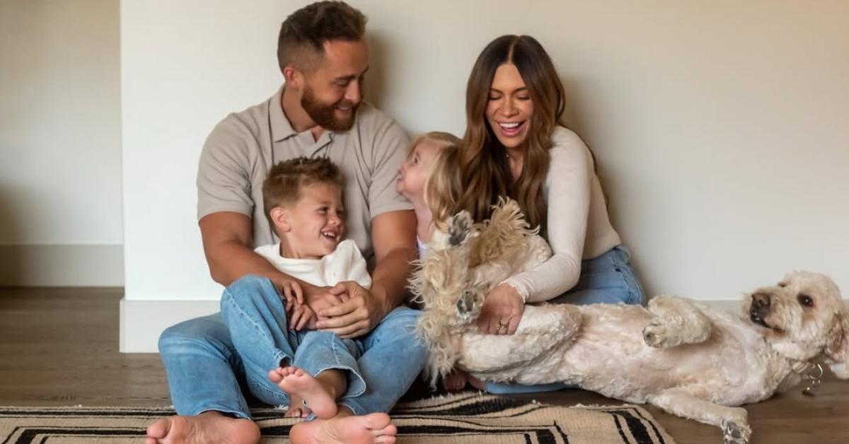 Jessi, Jordan, and their kids in their home.
