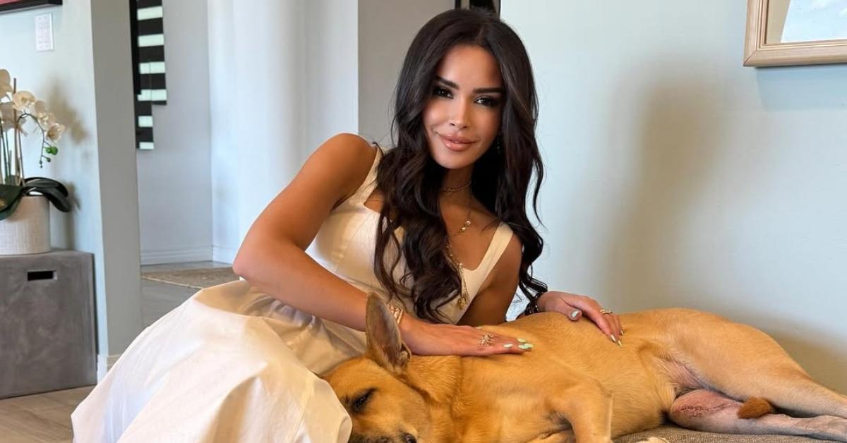 Tanin Nipkey with her dog in her home.