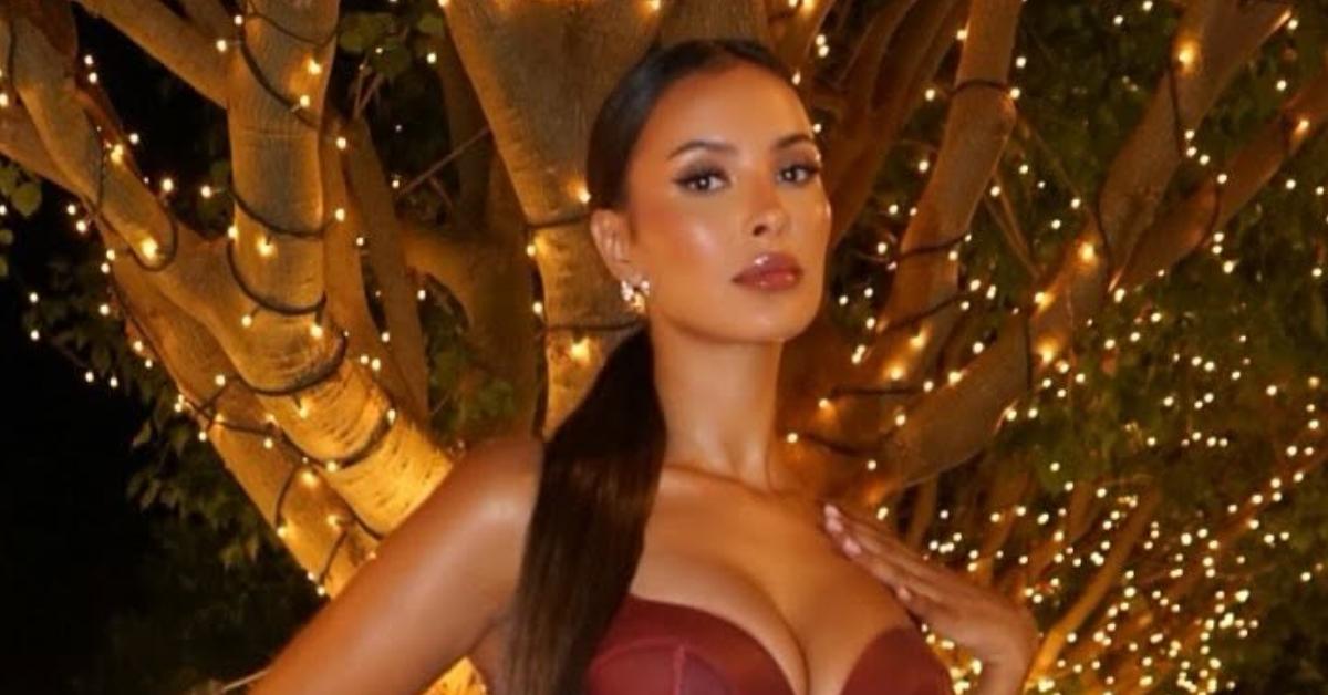 Maya Jama posing on the 'Love Island: All-Stars' set