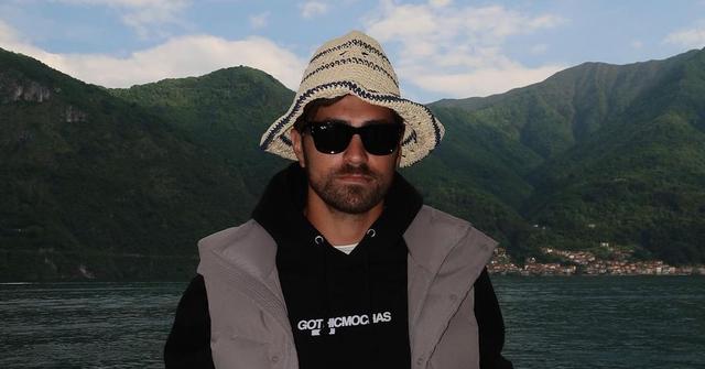 Toddy Smith wearing a bucket hat and a Gothic Mochas sweatshirt