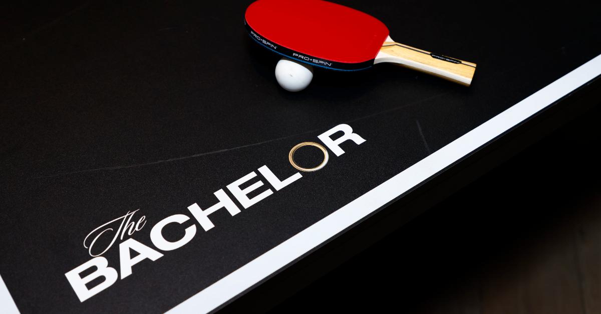 'The Bachelor' logo on a table tennis (ping-pong) table.