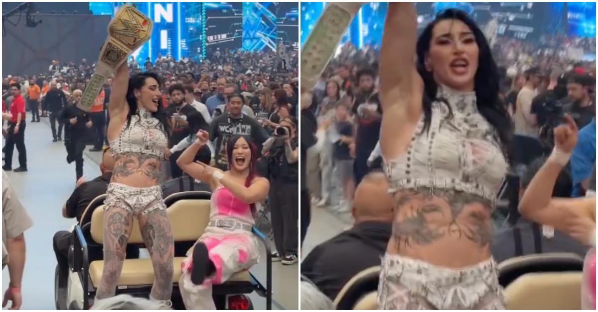 Rhea Ripley holding her championship belt after winning WrestleMania 42.