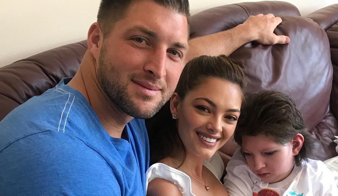 Tim and Demi-Leigh Tebow pose with Franje Nel-Peters