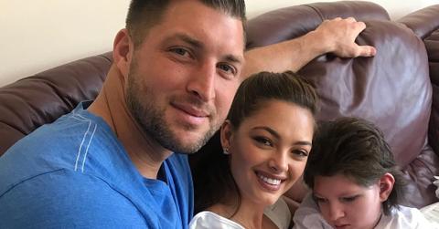 Tim and Demi-Leigh Tebow pose with Franje Nel-Peters