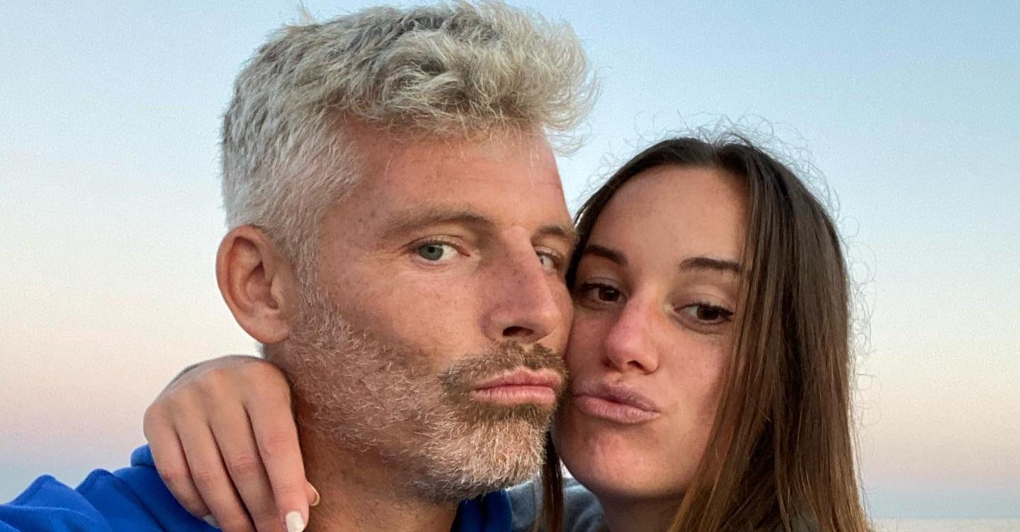 Hannah Berner and Des Bishop pose for a selfie on the beach.