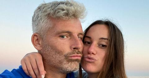 Hannah Berner and Des Bishop pose for a selfie on the beach.