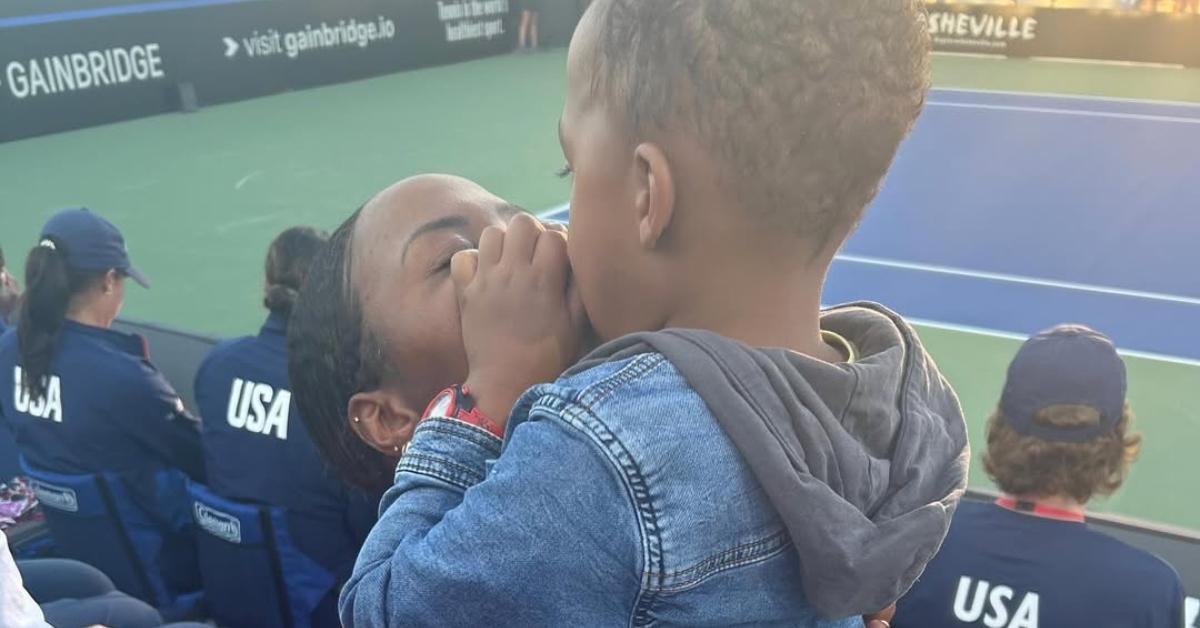 (l-r): Taylor Townsend with her son at a tennis match