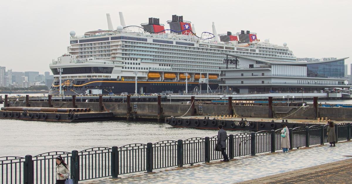 A Dicney cruise ship docked.