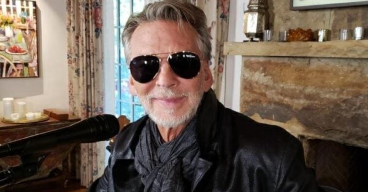 Kenny Loggins at home with his guitar.