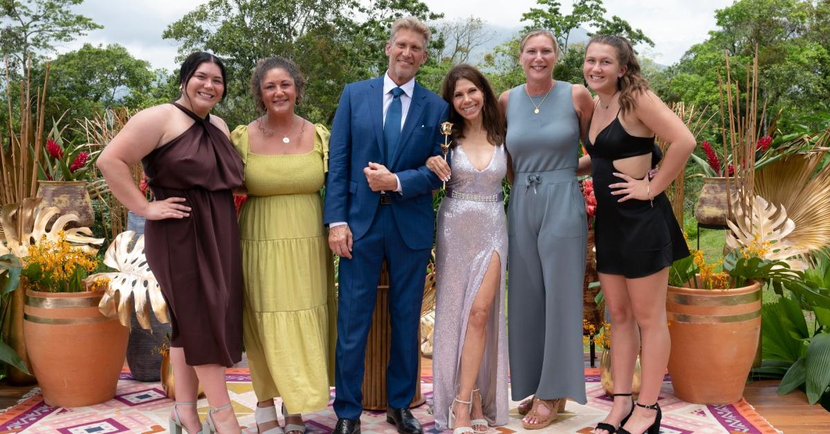 Gerry Turner and Theresa Nist posing with Gerry's family during the Season 1 finale of 'The Golden Bachelor