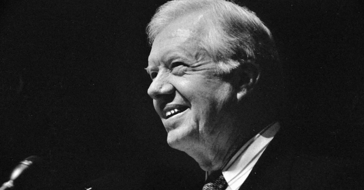 Jimmy Carter giving a speech in a black and white photo