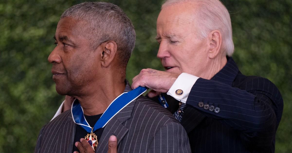 Joe Biden giving Denzel Washington the Medal of Freedom