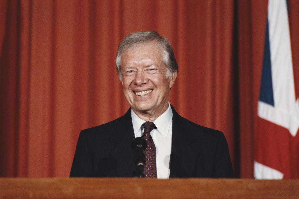 Jimmy Carter at a press conference at the American Embassy in 1986