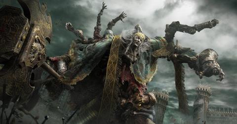 'Elden Ring' Godrick carrying his massive golden hammer into battle.