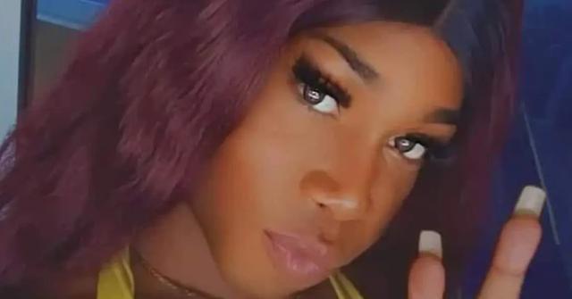 Chyna Long flashing the peace sign