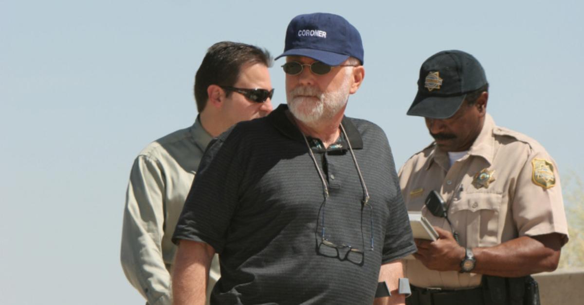 Robert David Hall inspects crime scene