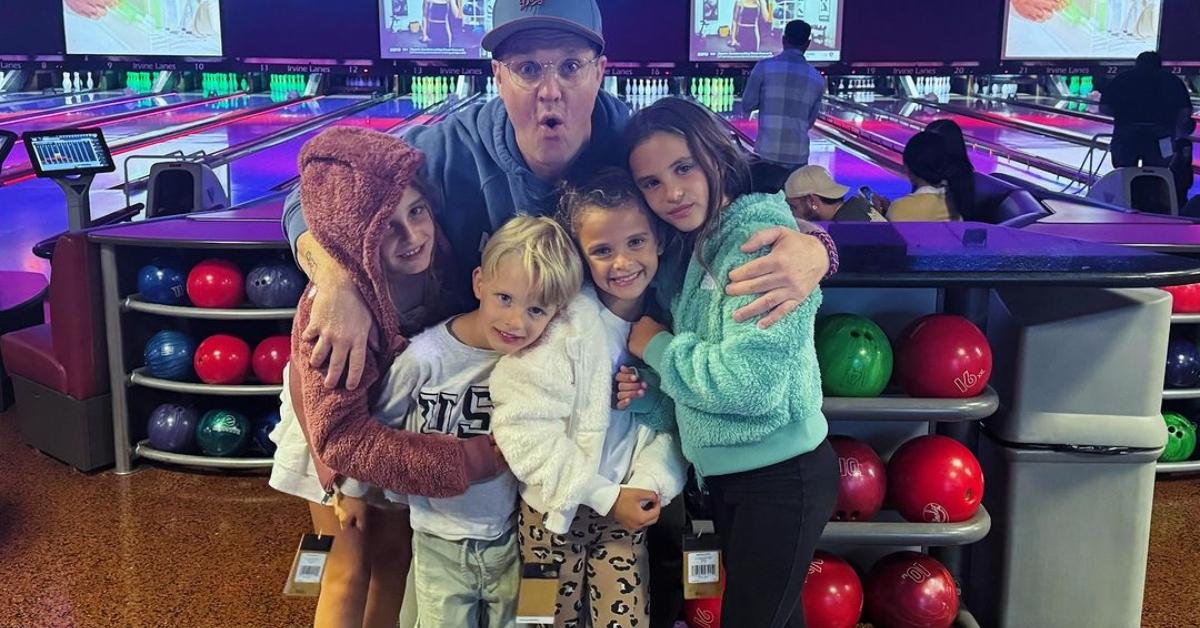 Zachery Ty Bryan with his kid sin a bowling alley