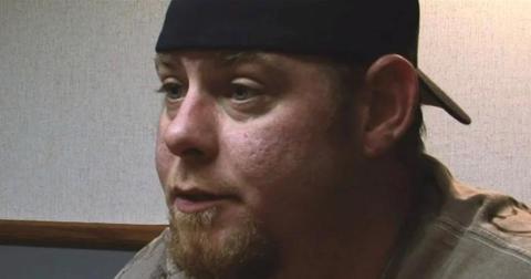 Justin Tennison wears a baseball cap backwards