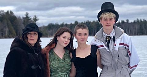 Marcia Gay Harden standing with her kids, Eulala, Julitta, and Hudson