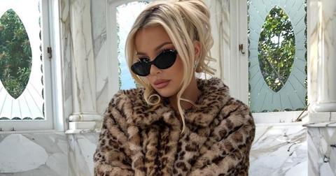 tana mongeau in a fur coat