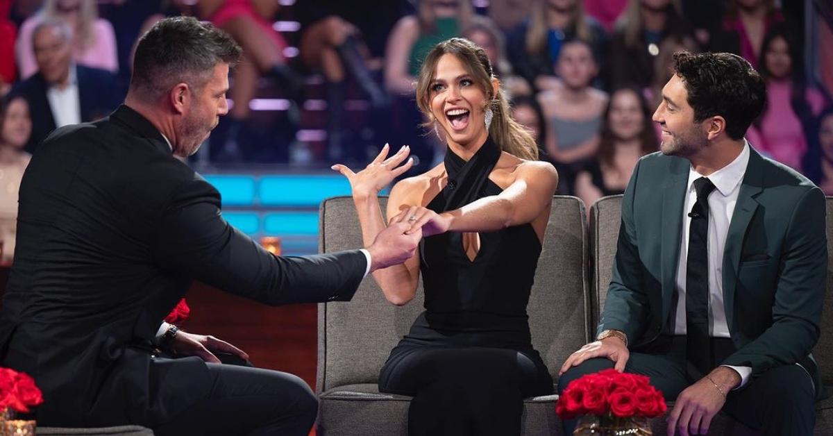 Kelsey Anderson showing her engagement ring to Jesse Palmer as Joey Graziadei stares at her on 'The Bachelor'