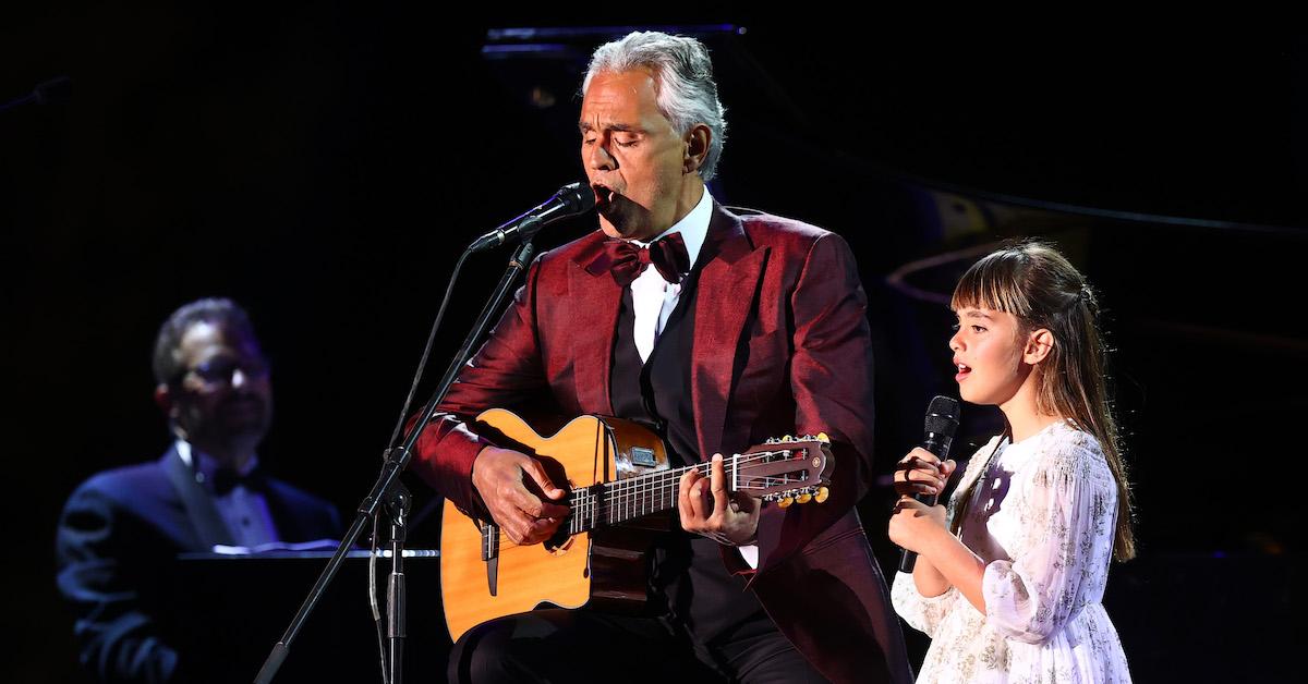 Andrea Bocelli at the piano with his wife Enrica Cenzatti and their son Amos.  The Italian tenor Andrea Bocelli seated at the …