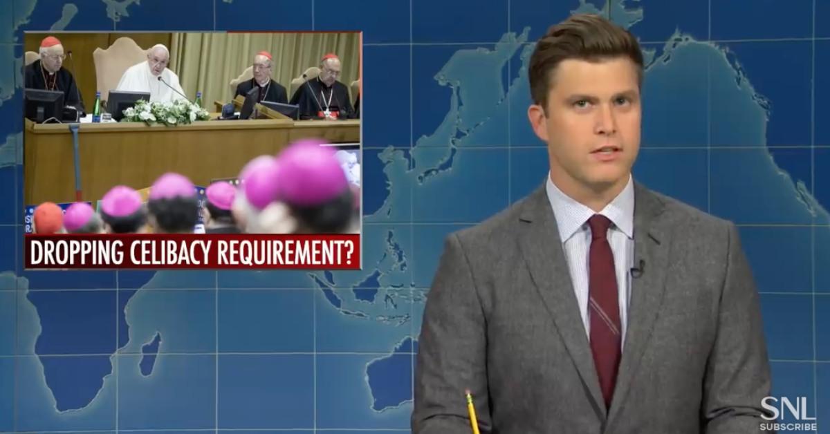 Colin Jost telling a joke centering around Catholicism on Weekend Update.