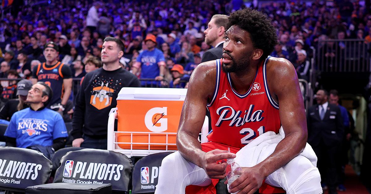 Joel Embiid sitting on the bench during game 1 of 76ers vs. Knicks. 