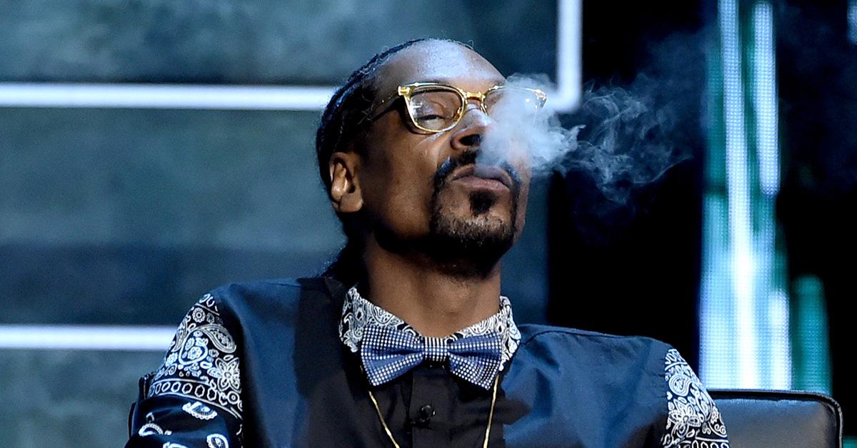 Snoop Dogg smoking during a Comedy Central Roast. 