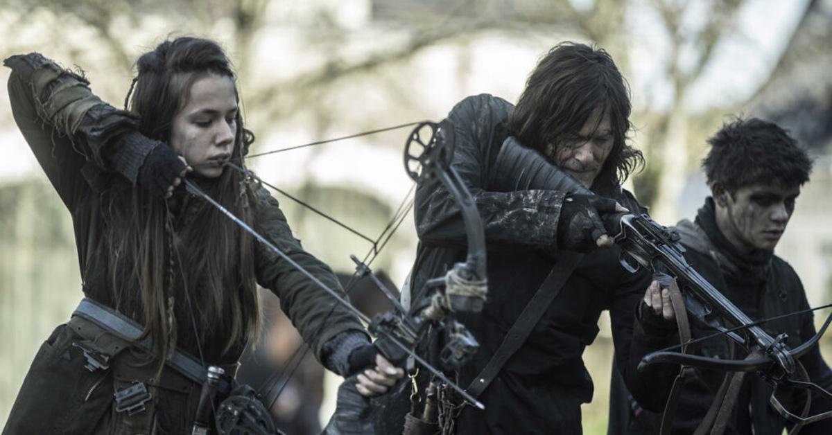 The cast of 'The Walking Dead: Daryl Dixon' pointing bows and crossbows. 