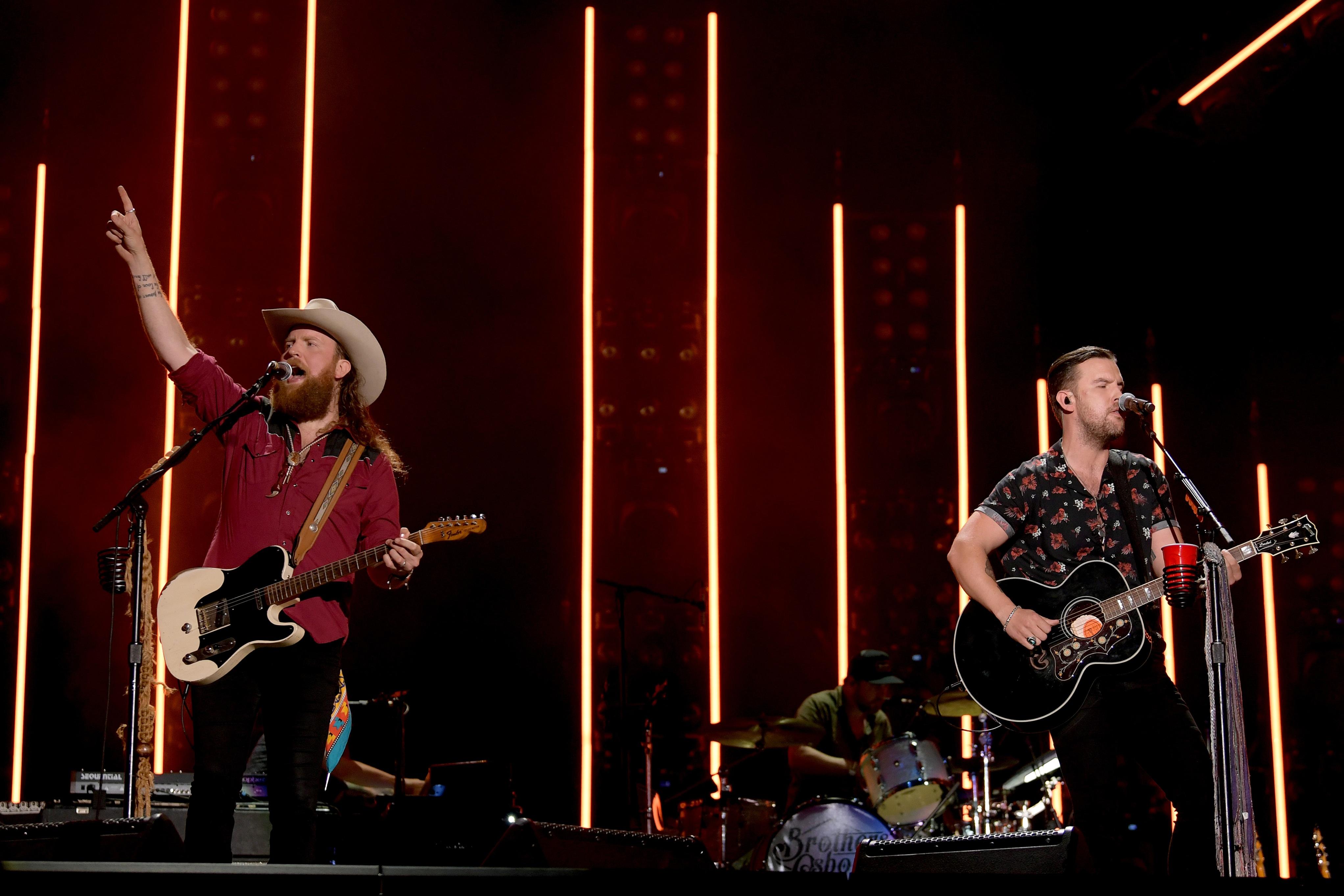 The Brothers Osborne performing on stage.