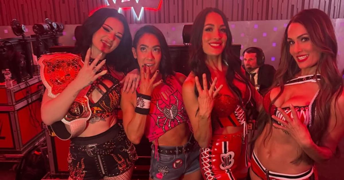 Paige with the other three Horsewomen of the WWE.