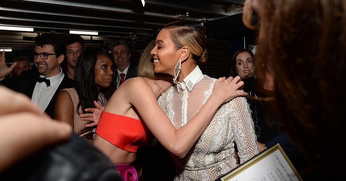 Beyonce and Taylor Swift behind the scenes of the 58th Grammy Awards. 