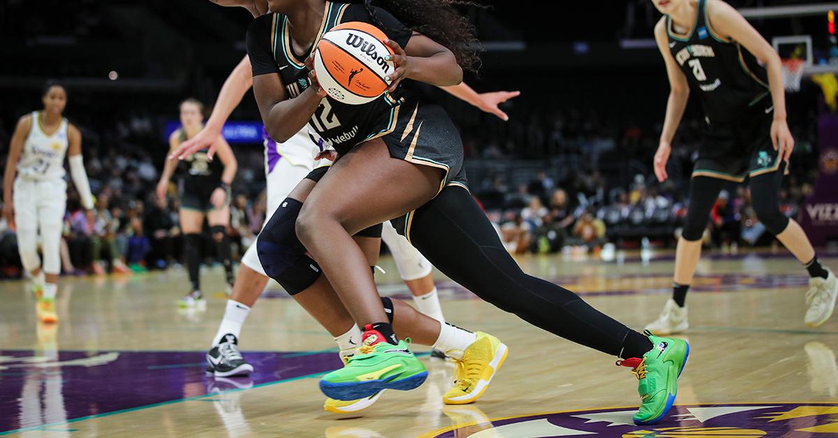 Michaela Onyenwere wears one leg sleeve during basketball games