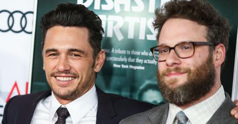James Franco and Seth Rogen standing beside each other smiling for the camera