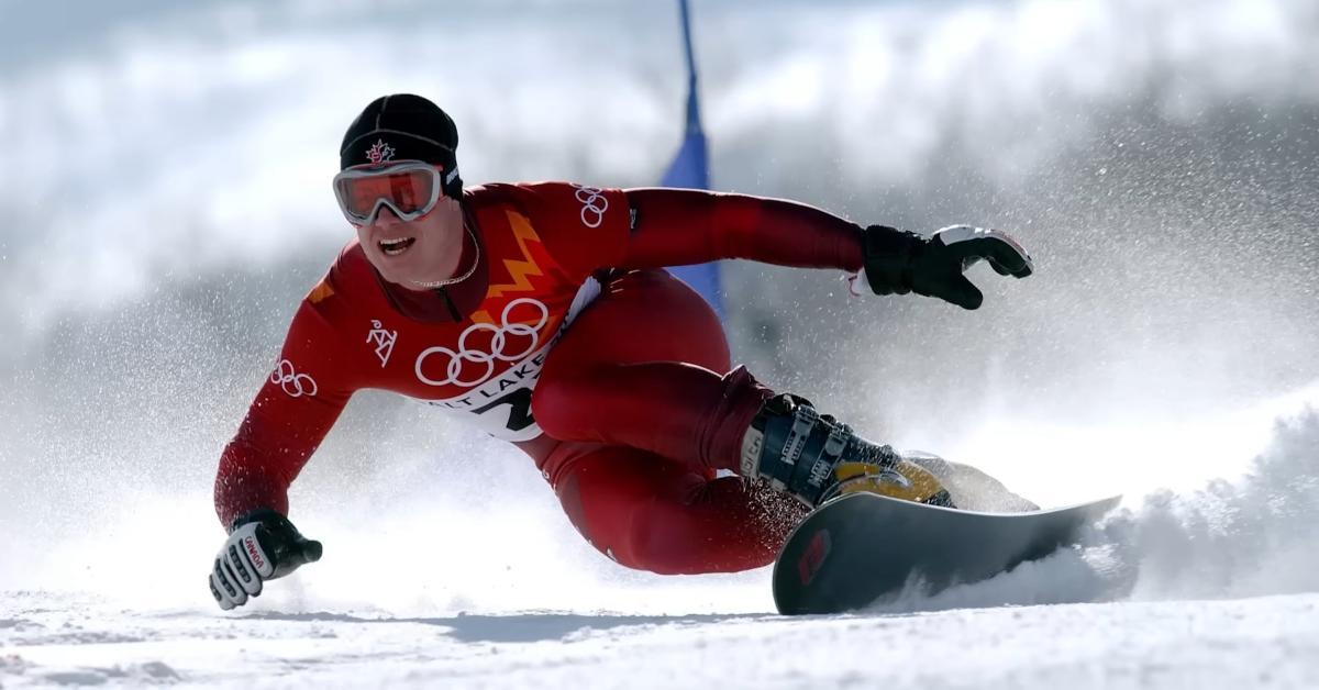 Ryan Wedding competing in a snowboarding event during the SLC Winter Olympics
