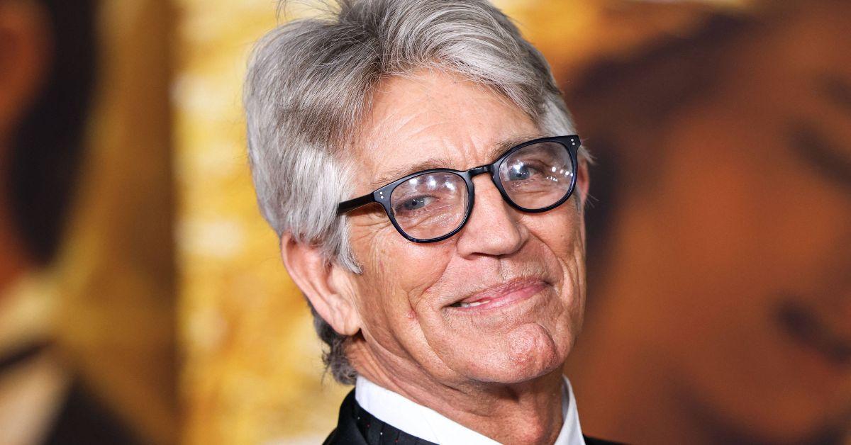 Eric Roberts poses for a photo on the red carpet of an awards ceremony