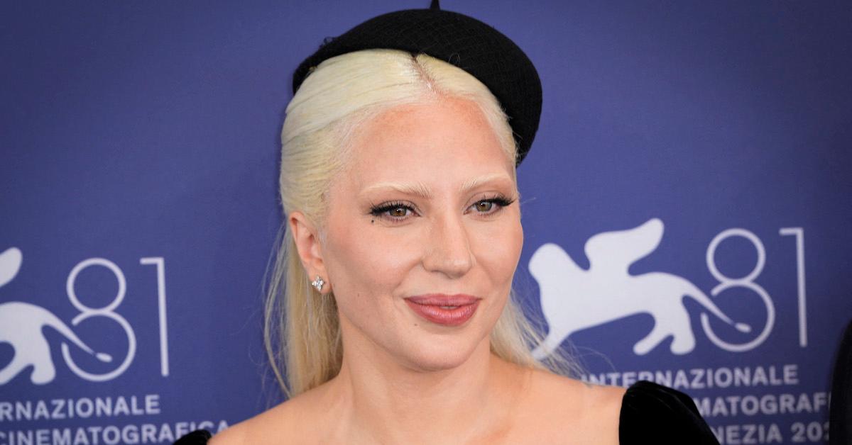 Lady Gaga wears a black hat and dress at the 81st Venice International Film Festival on Sept. 4, 2024