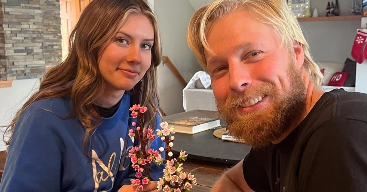 Ethan Plath with his girlfriend in his kitchen