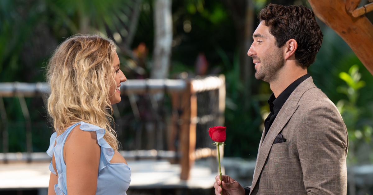 Joey Graziadei gives Daisy Kent a rose during the rose ceremony, securing her spot in the final two.