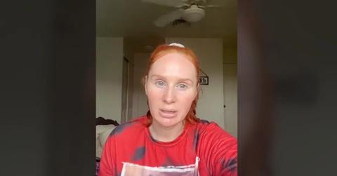 Ashley Elliott wearing a red shirt