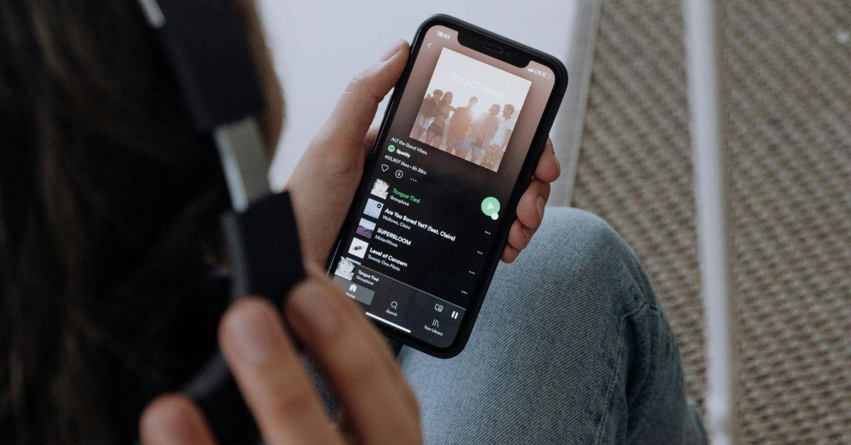 Person Using Spotify