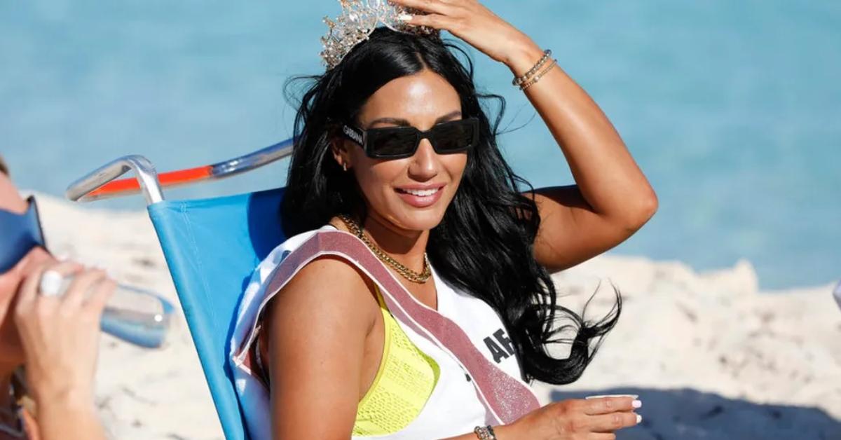 Monica Garcia on the beach with a tiara