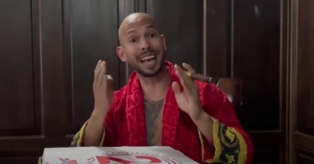 andrew tate with pizza box