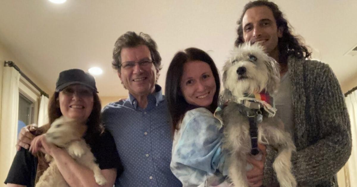 Geoff Fox with his wife, their daughter, son-in-law, and two dogs