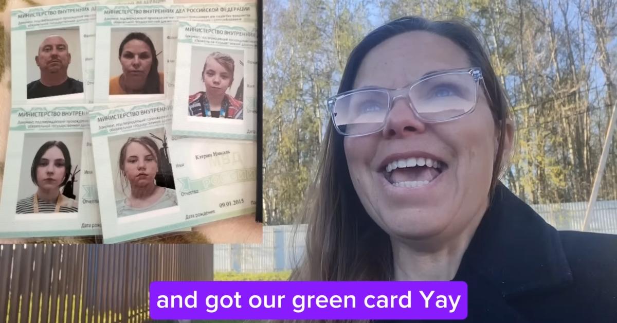 The Huffman family shows off their Russian documents